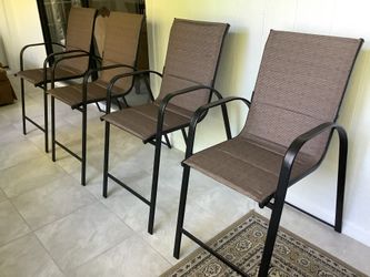 4 new brown sling fabric stacking outdoor;patio Bar Chairs. Support active arm and foot rests. Excellent Condition . $35.00 each