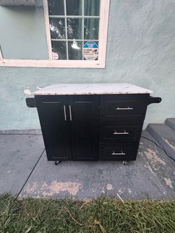 Kitchen  Island  28”D X 36”H X 54”W