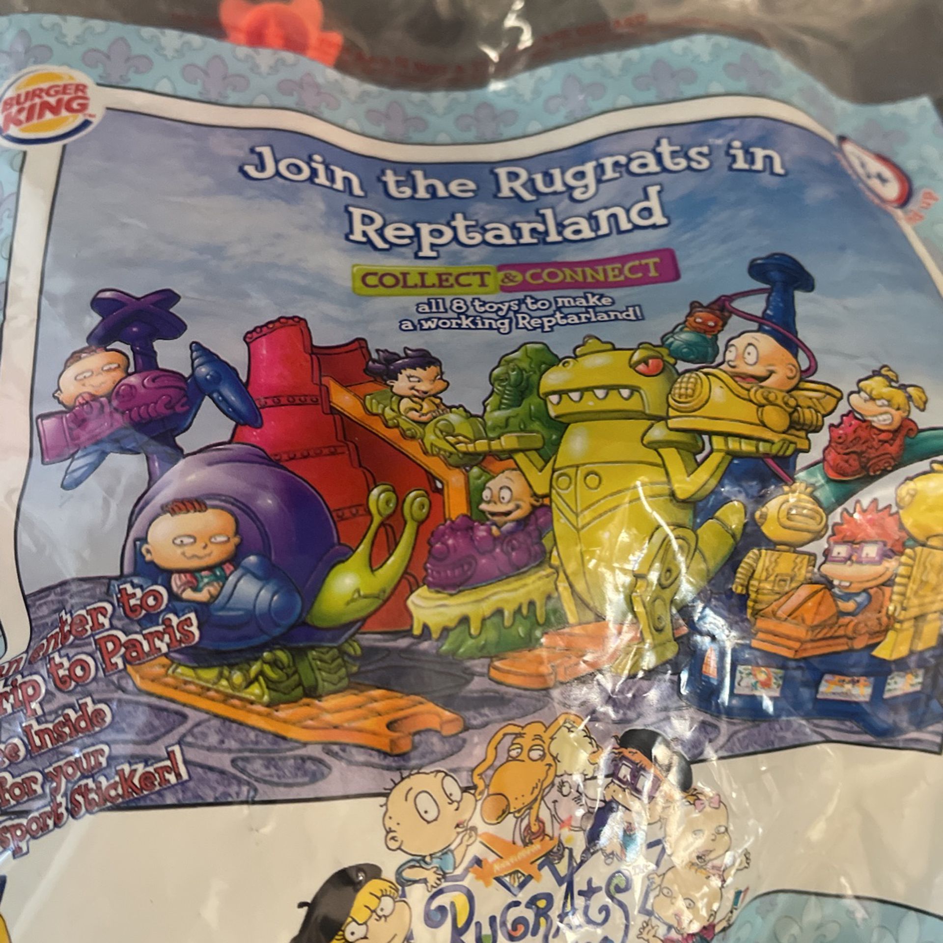 Join the Rugrats in raptor land collectible Burger King toy