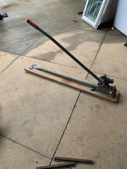 Rebar bend and cutter