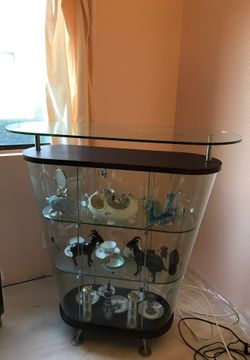 Beautiful Almost new three shelf glasses cabinet
