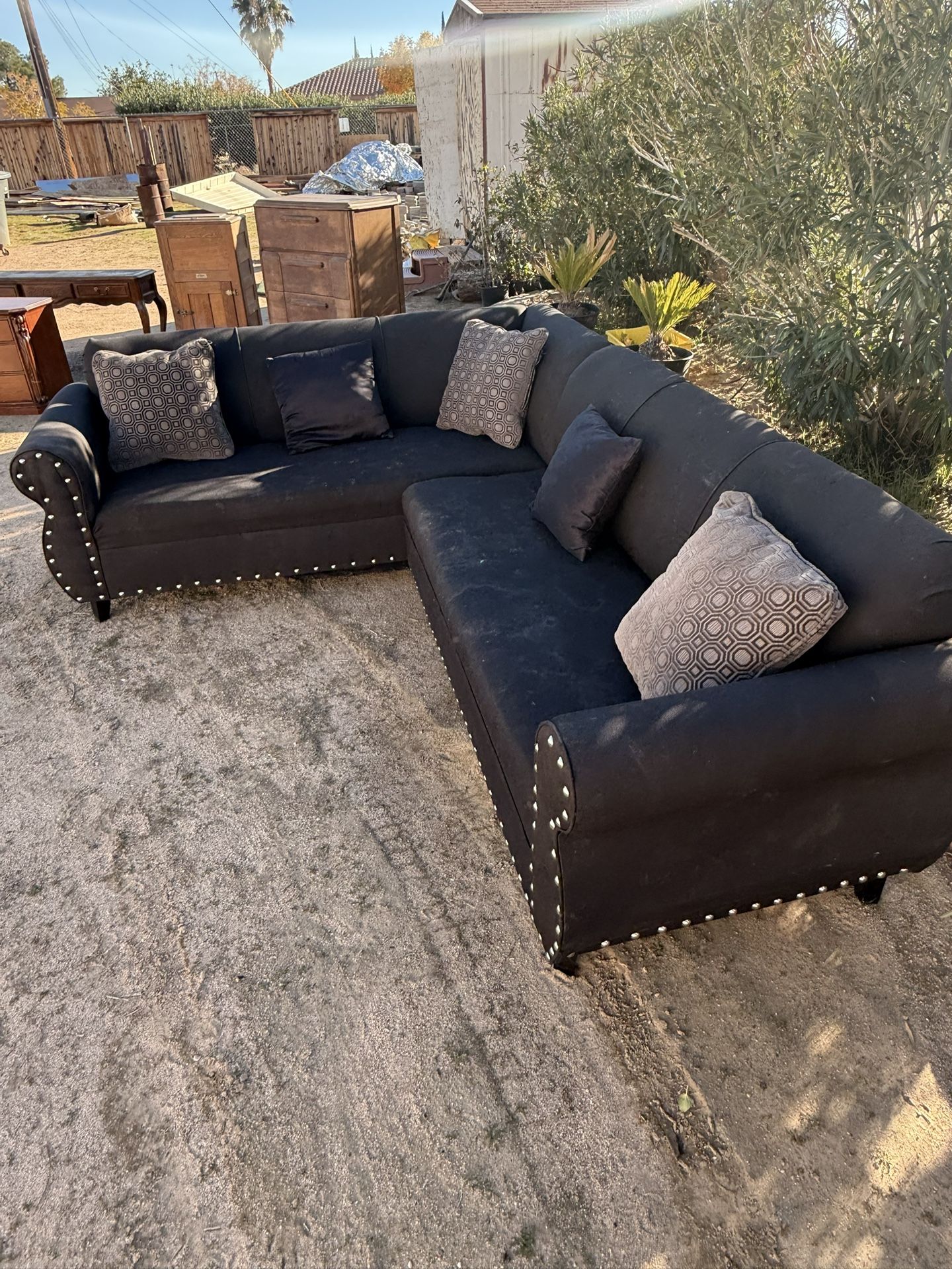 Black Basic Tufted Couch With Permanent Stains 