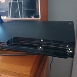 Ps3 with wireless controller and 15 games