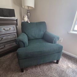 Upholstered green chair