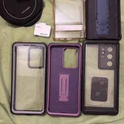 Phone Cases And A Fast Charger And Screen Protectors 