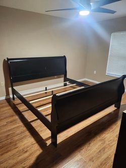 Kind size black sleigh bed frame