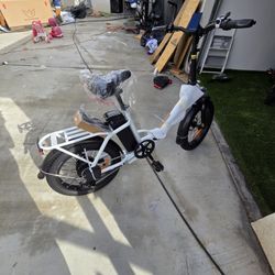 This is a brand new wind horse. Bike 20 inch. The bike folds in half