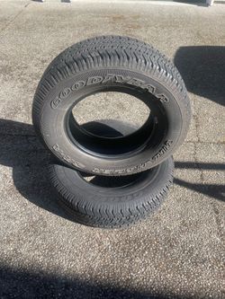 2 used 235/70R18 good year wrangler  Both tire has 1 patch