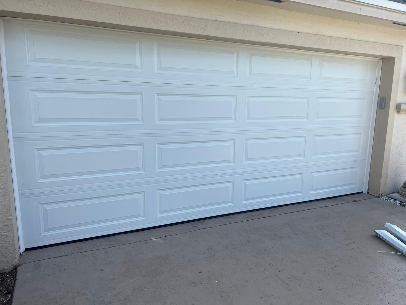 New White 2-Car Garage Door 16x7 – FREE Install + Hurricane Rated