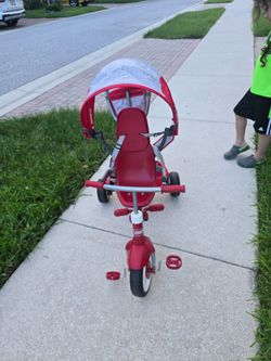 Radio Flyer 4-in-1 Stroll 'N Trike - Red: Adjustable Seat, Steel Frame, Ages 1-5