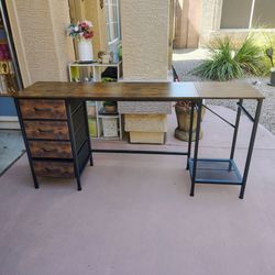 Very nice brown table with four drawers