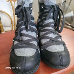 Boots/ shoes  size 8 by Merrell. Gently used.
