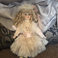 Vintage Porcelain Doll $25