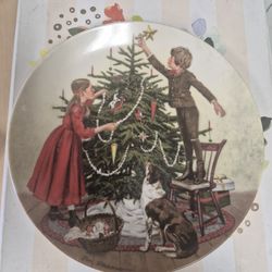 vintage 1983 "Christmas" collector plate from the Americana Holidays Collection, manufactured by Edwin M. Knowles. 