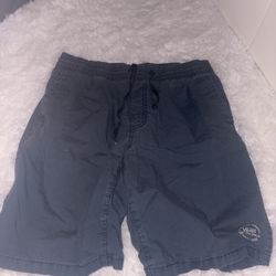 MEDIUM SIZED NAVY BLUE  VANS SHORTS 