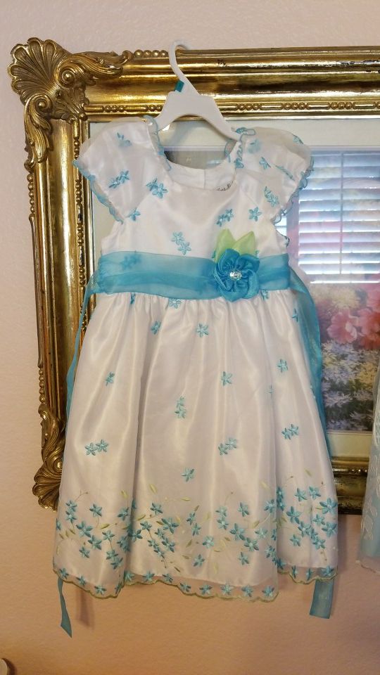 Girls dresses size 5 and 4. Lightly used easter dresses!