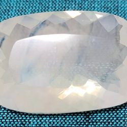 Rare 29.50 CT Loose Mexico Yellow Blue Opal Like Cushion Cut Gemstone. This rare 29.50 CT Loose Mexico yellow blue opal-like stone cushion cut is a st