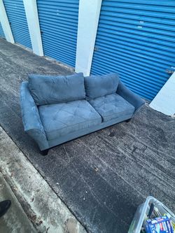 Blue suede sofa