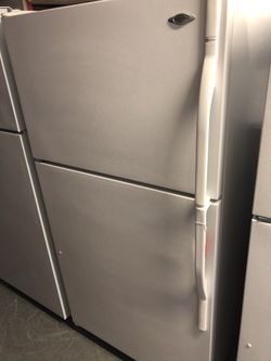 Used Maytag top and bottom fridge. 1 year warranty