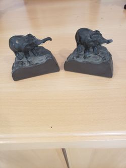 pair of antique bronzed metal mini elephant bookends.