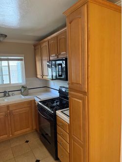 Kitchen - Cabinets and Fridge, Stove, Microwave