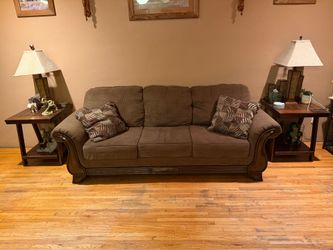 2sofas with tables and lamps