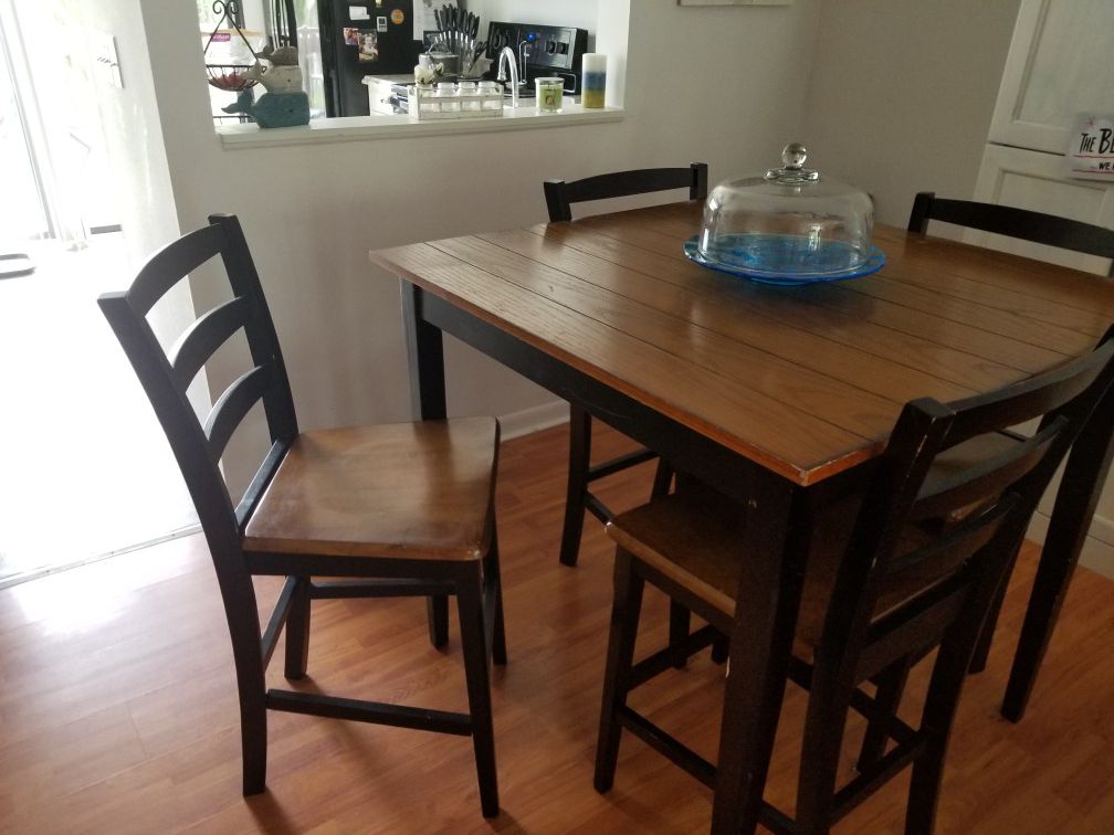 Bar height table and 4 chairs