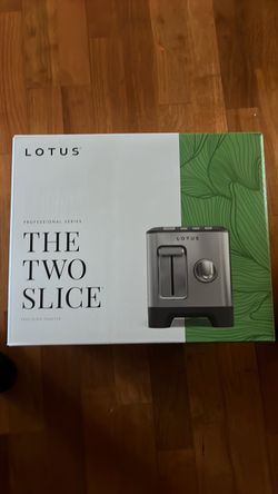 New in box Lotus toaster the two slice.