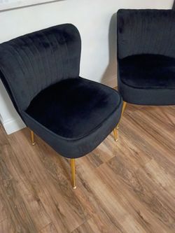 Black velvet pair slipper chairs