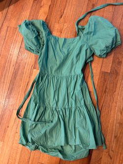 Green mini dress with tie and open back detail. Size medium