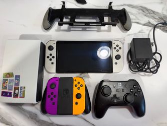 Nintendo switch oled BUNDLE 230$ no negociable
