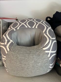 Arm rest for feeding baby