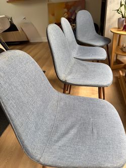 4 dinning chairs blue-gray fabric metal-wood legs