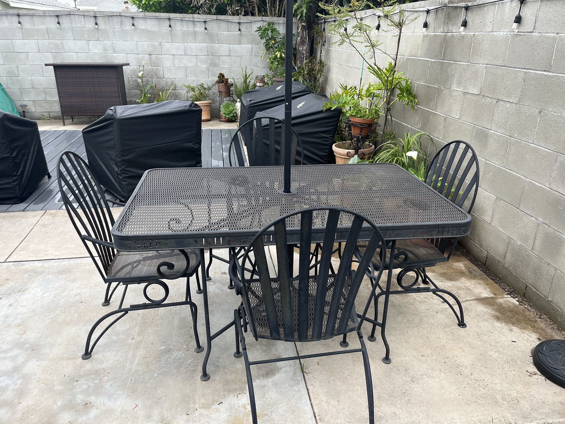  Black table and glider loveseat