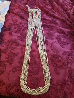 10 strands of extra large pearls