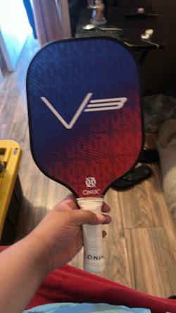 Racket ball and paddle