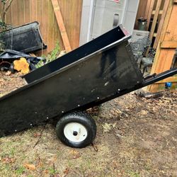 Tow behind dump cart