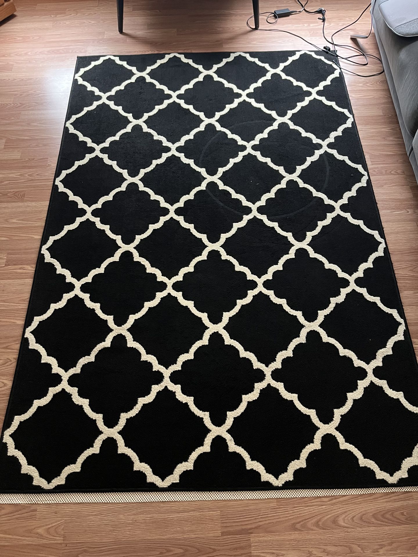 Black & Cream Colored Rug