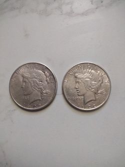(2) 1922 Peace Silver Dollars
