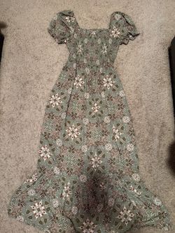 Green patterned dress with stretchy corset waist part