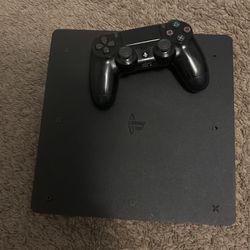 PS4 With Both Cables And A PS4 Controller