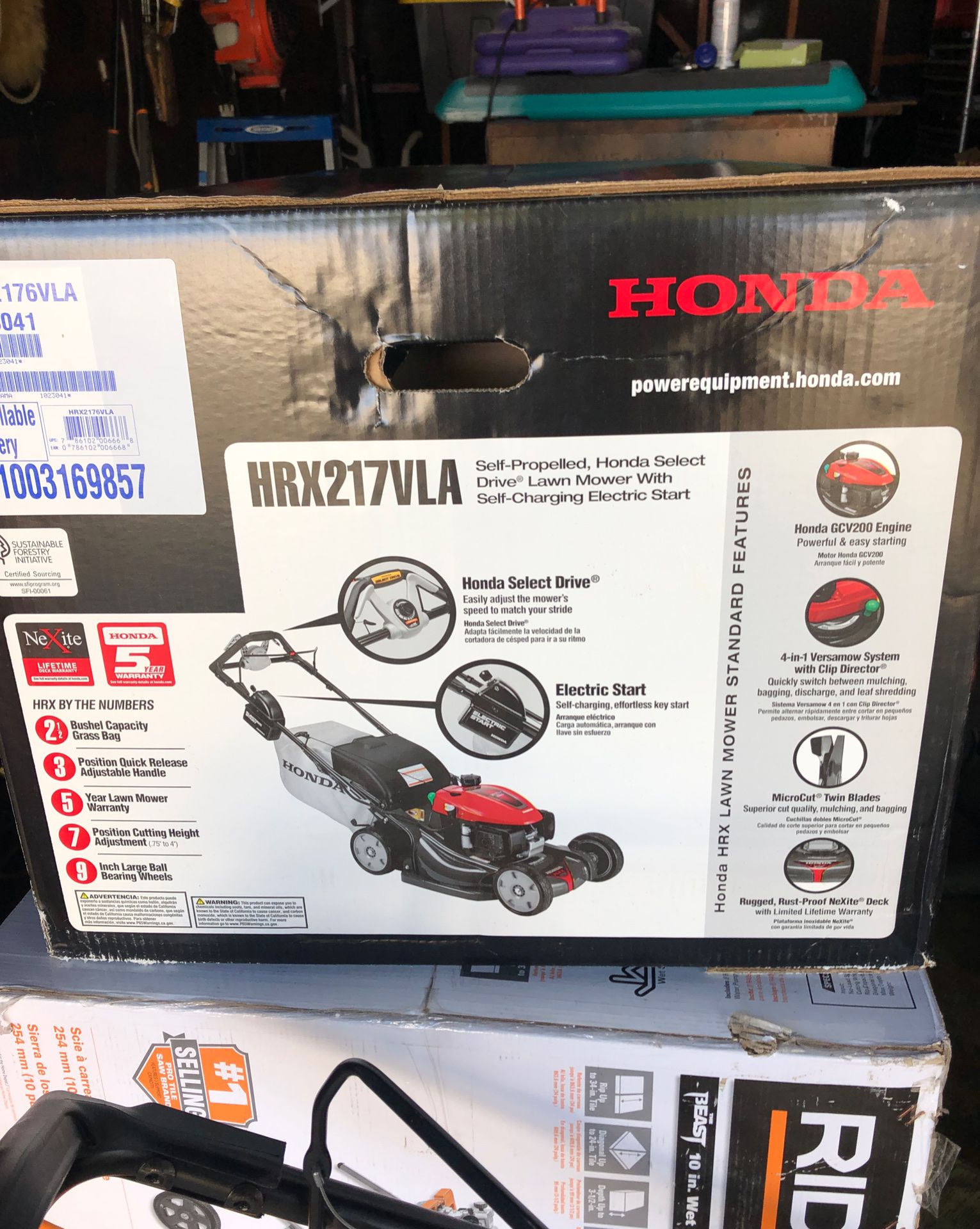 Honda Lawn mower one in box other out one out of box Has only a couple hours of use