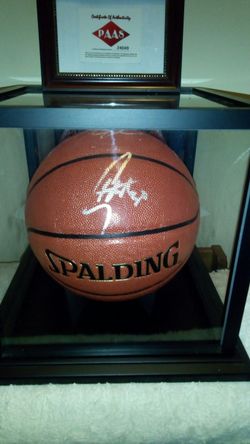 Authentic hand sighed Stephen Curry and Kevin Durant signed basketball in mirrored display case with certificate of authenticity