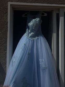 Quinceanera dress only worn once the blue one only