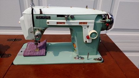 Vintage New Home sewing machine.