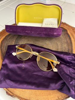 Pre-Loved Gucci all gold frame & lense glasses.
