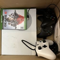 Xbox with 3 controls and Gears 5 Game