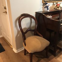 Antique Chair With Grape Design 
