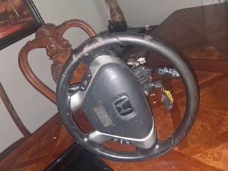 Steering wheel column and key