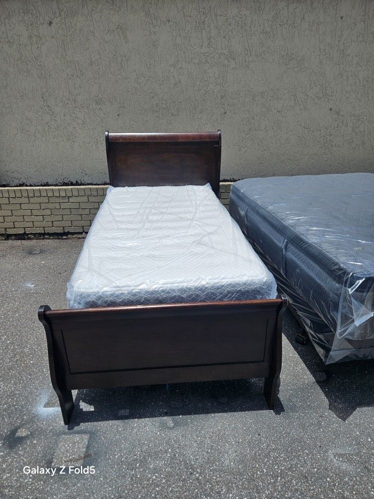 Brown Cherry Twin Size Solid Wood Sleigh Bed Frame With Brand New Twins Size Plush Mattress And Box Spring In Plastic